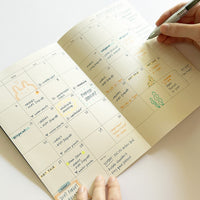 Compact 12 months Planner