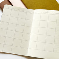 Compact 12 months Planner